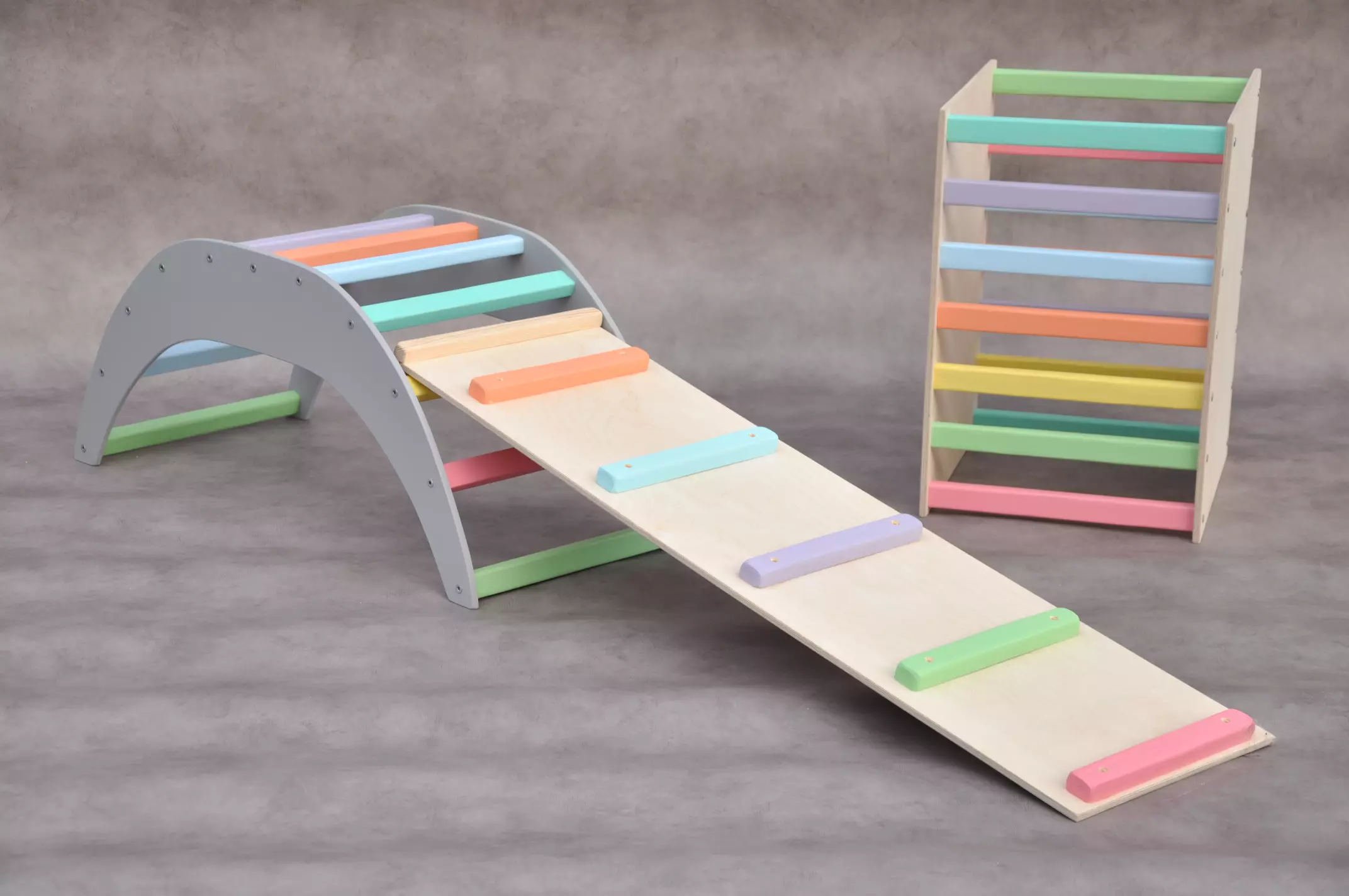 Big Montessori climbing frames set (arch & rocker, triangle, tunnel and ball pit, ladder & slide) for toddler physical education and development available at Barin Toys online wooden toys store with free delivery across the Europe, Switzerland and UK.